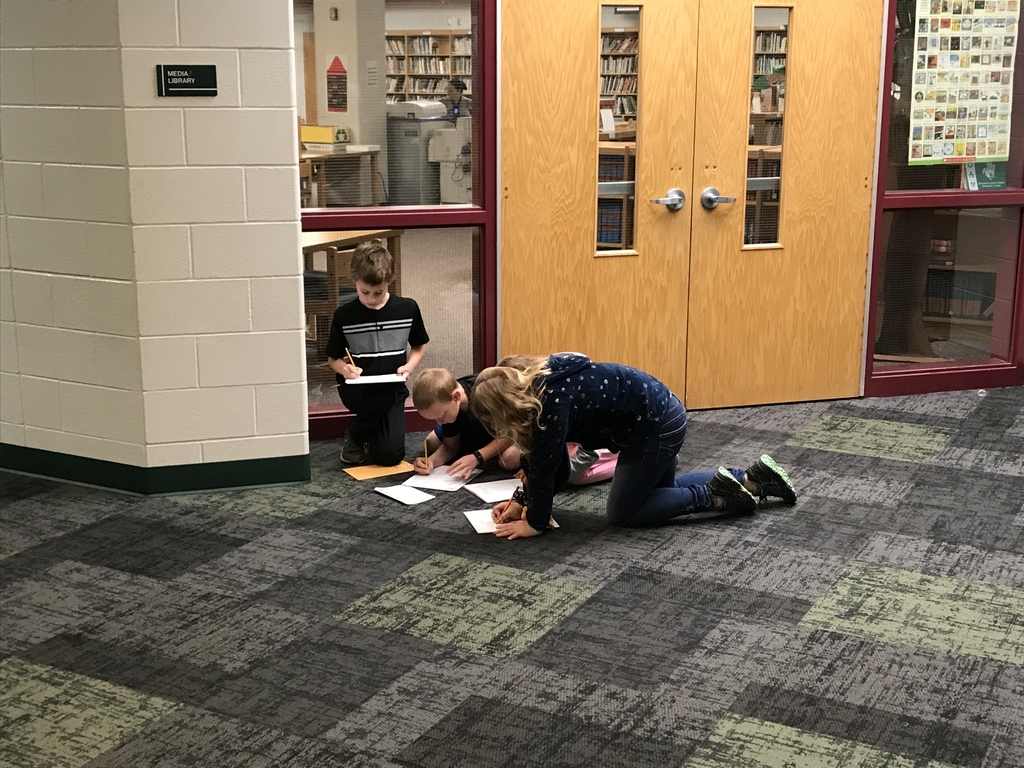 Students writing answers